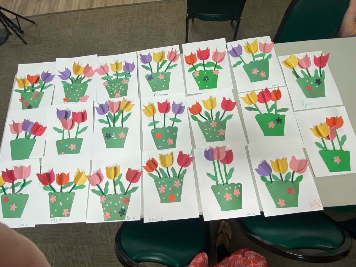 Paper flower pots with camper names